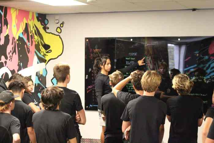 Izzy McMahon training younger athletes.
