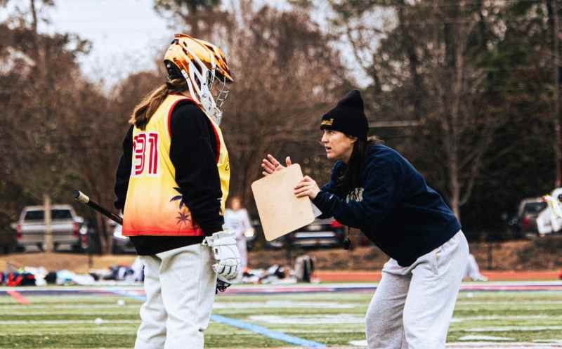 (Photo/Goaliesmith) Meg Taylor coaching a young player.